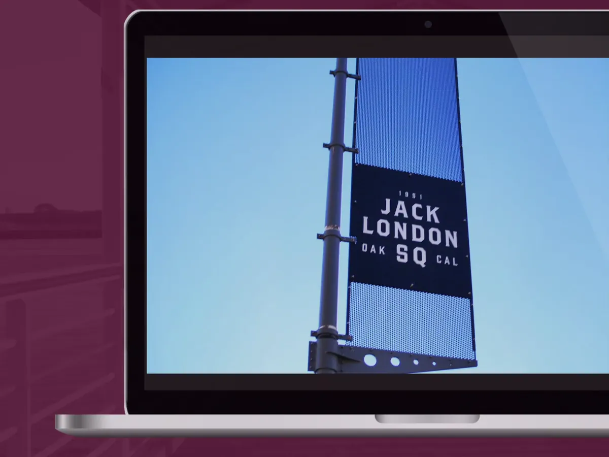 Jack London Square banner on a laptop screen